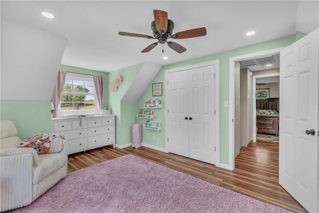 bedroom featuring a closet, recessed lighting, baseboards, ceiling fan, and wood finished floors