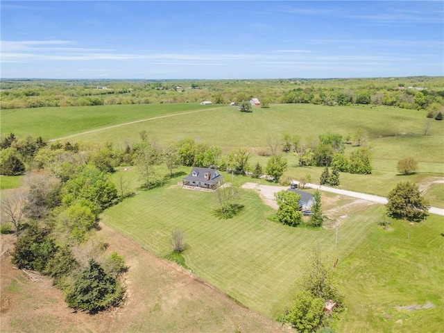 birds eye view of property featuring a rural view