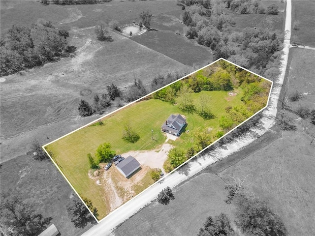 birds eye view of property featuring a rural view