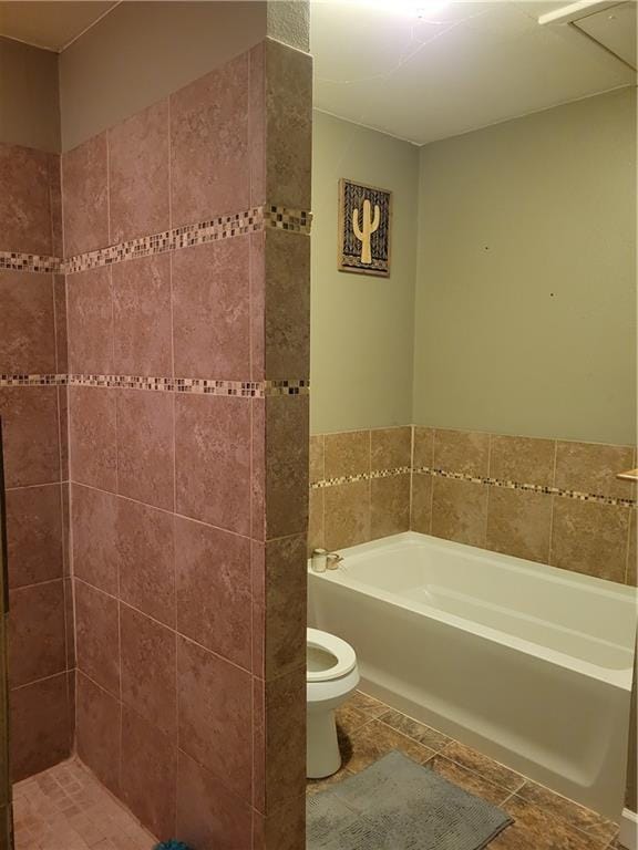 full bathroom featuring toilet, a tile shower, and a bath