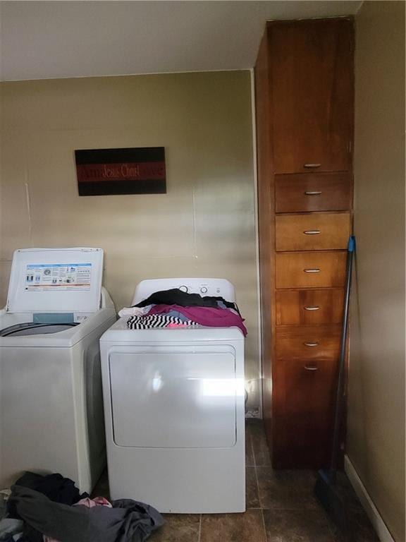 laundry area with separate washer and dryer and laundry area