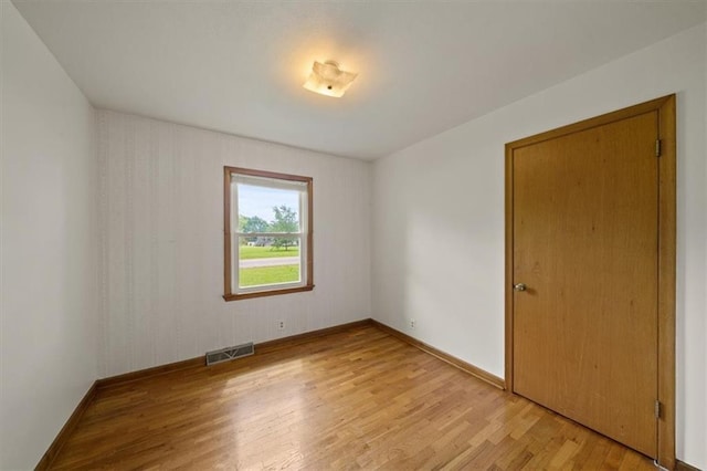 26335 W 321st Ter, Paola, KS 66071 - empty room featuring light wood-style flooring and baseboards