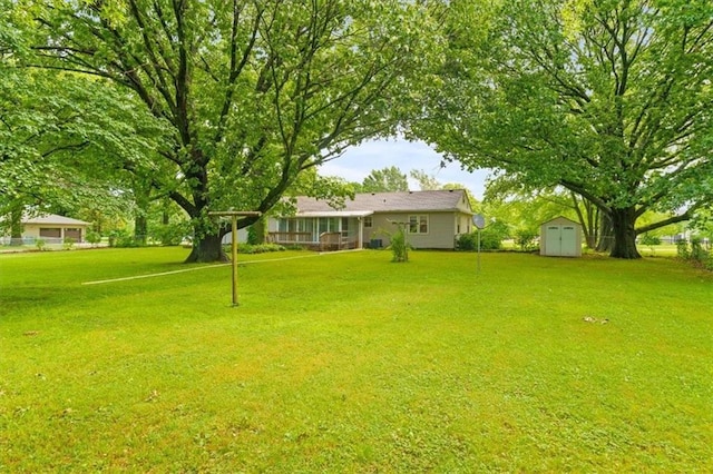 26335 W 321st Ter, Paola, KS 66071 - view of green lawn with a storage shed