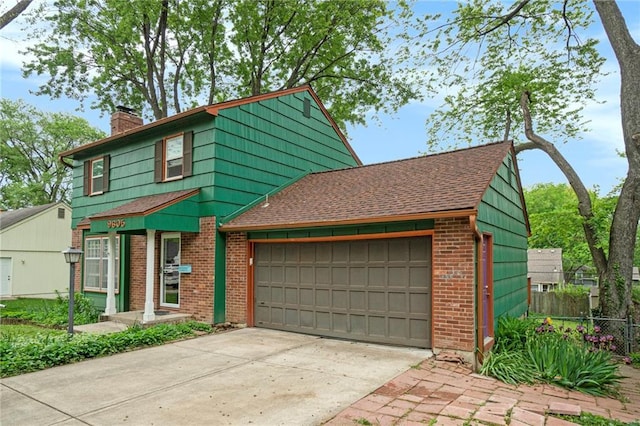 view of front of house with fence, roof with shingles, brick siding, a garage, and a chimney
