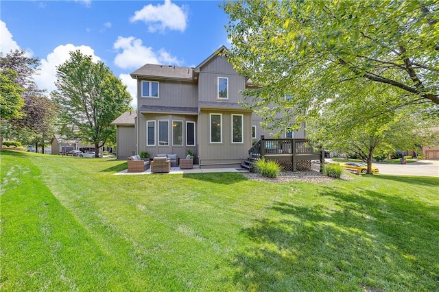 22420 W 44th Ter, Shawnee, KS 66226 - rear view of property featuring an outdoor living space, a deck, a lawn, and a patio area