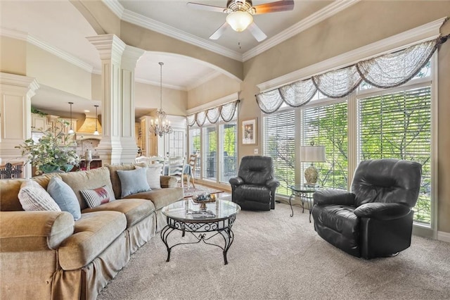 10522 N Garfield Ave, Kansas City, MO 64155 - living room with decorative columns, carpet flooring, ornamental molding, a ceiling fan, and a chandelier