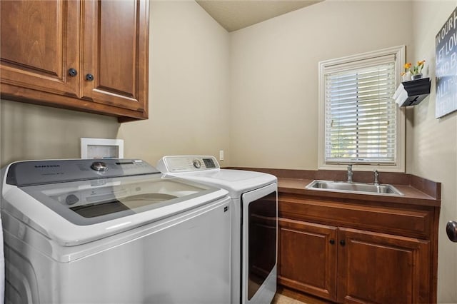 10522 N Garfield Ave, Kansas City, MO 64155 - washroom featuring independent washer and dryer and cabinet space