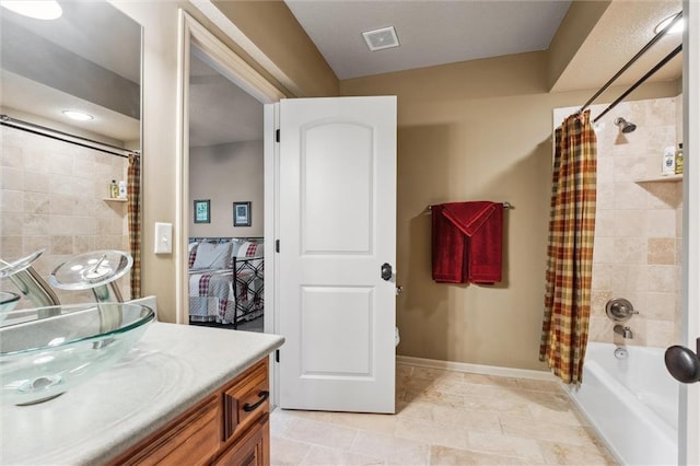 10522 N Garfield Ave, Kansas City, MO 64155 - bathroom featuring baseboards, shower / tub combo, and vanity