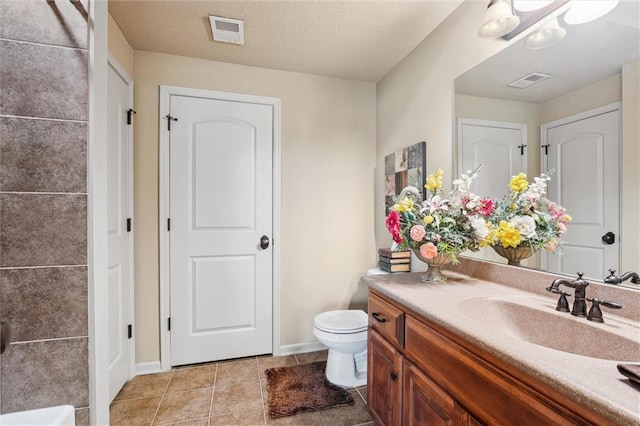 10522 N Garfield Ave, Kansas City, MO 64155 - bathroom featuring vanity, toilet, baseboards, and tile patterned floors