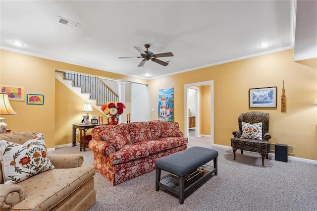 living area with carpet floors, crown molding, stairway, a ceiling fan, and baseboards