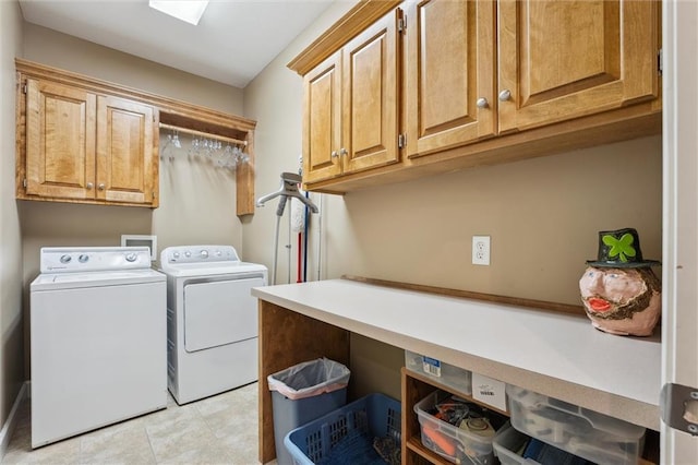 laundry room featuring cabinet space and washing machine and clothes dryer