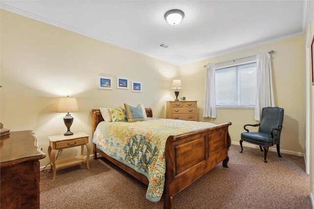 bedroom featuring crown molding, carpet flooring, and baseboards