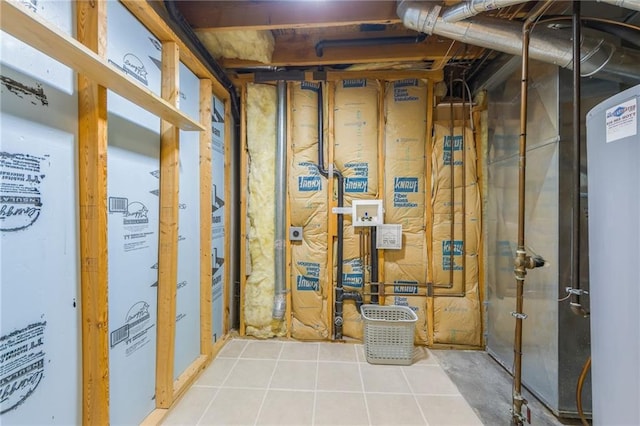 unfinished basement featuring tile patterned flooring