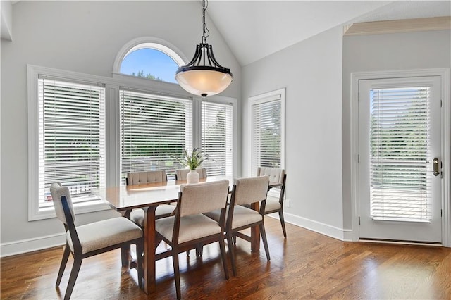 14575 Granada Cir, Leawood, KS 66224 - dining space with vaulted ceiling and wood finished floors