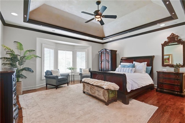 14575 Granada Cir, Leawood, KS 66224 - bedroom with a raised ceiling, dark wood-style floors, crown molding, recessed lighting, and ceiling fan