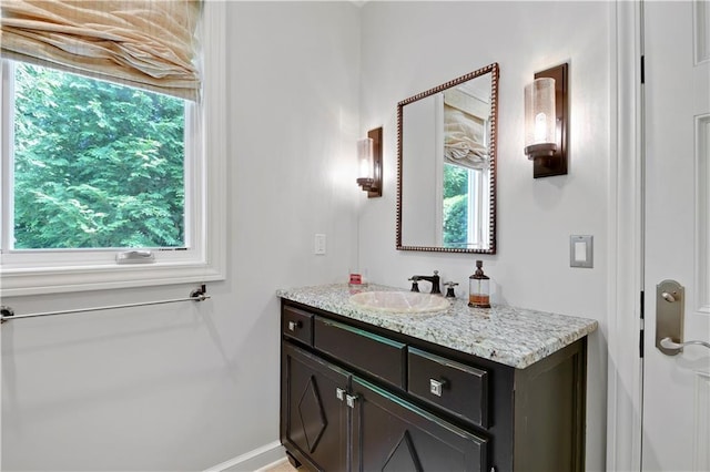14575 Granada Cir, Leawood, KS 66224 - bathroom featuring vanity and baseboards