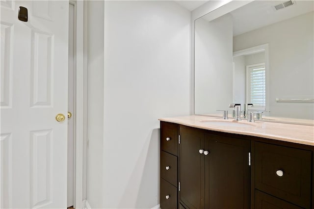 14575 Granada Cir, Leawood, KS 66224 - bathroom with vanity and baseboards