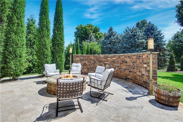 14575 Granada Cir, Leawood, KS 66224 - view of patio featuring a fire pit