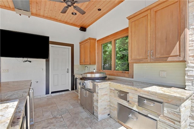 14575 Granada Cir, Leawood, KS 66224 - kitchen featuring wood ceiling, ceiling fan, light stone finish floors, light stone counters, and decorative backsplash