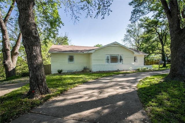 4904 Grandview Rd, Kansas City, MO 64137 - exterior space with concrete driveway