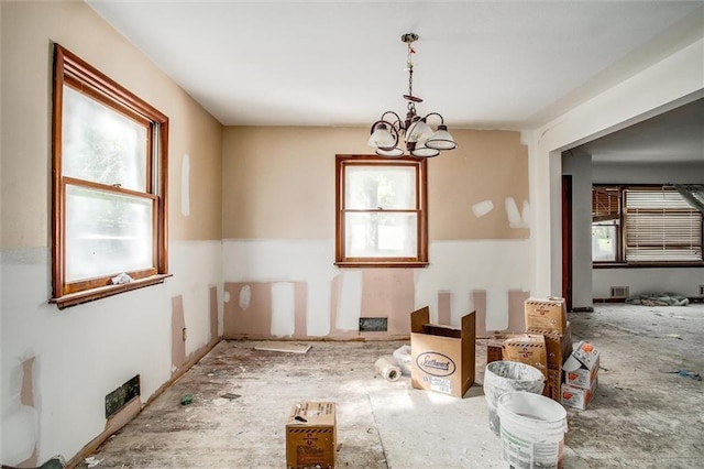 4904 Grandview Rd, Kansas City, MO 64137 - dining space featuring an inviting chandelier and visible vents