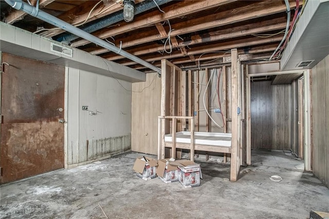 4904 Grandview Rd, Kansas City, MO 64137 - unfinished basement featuring visible vents