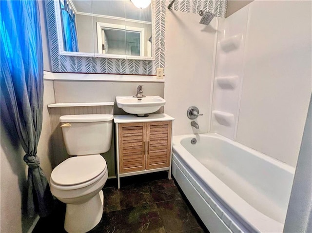 full bath featuring shower / bath combo with shower curtain, toilet, a wainscoted wall, and vanity