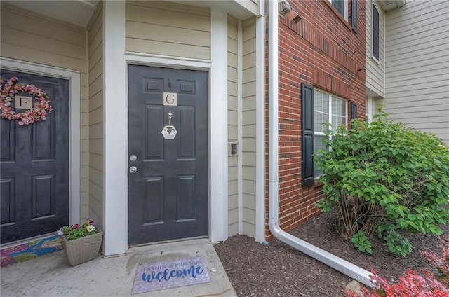 11629 Tomahawk Creek Pkwy Unit G, Leawood, KS 66211 - entrance to property with brick siding