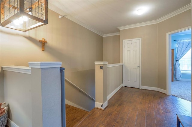11629 Tomahawk Creek Pkwy Unit G, Leawood, KS 66211 - hallway with an upstairs landing, hardwood / wood-style flooring, crown molding, and baseboards