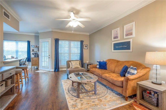 11629 Tomahawk Creek Pkwy Unit G, Leawood, KS 66211 - living room featuring dark wood finished floors, a ceiling fan, crown molding, and baseboards