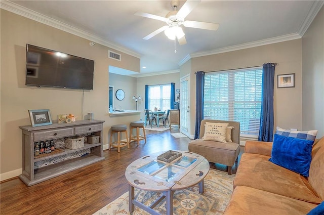 11629 Tomahawk Creek Pkwy Unit G, Leawood, KS 66211 - living room featuring wood finished floors, crown molding, a ceiling fan, and baseboards