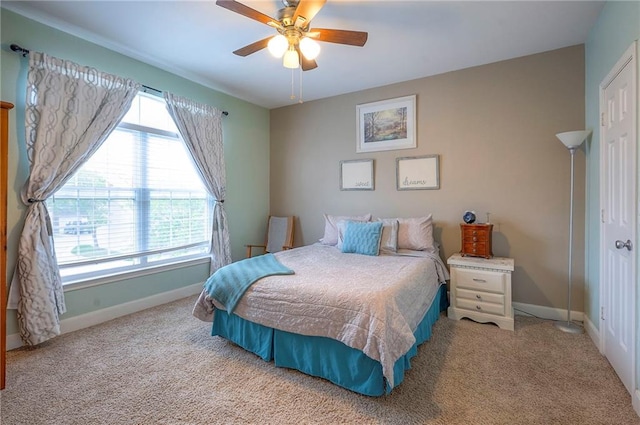 11629 Tomahawk Creek Pkwy Unit G, Leawood, KS 66211 - bedroom featuring baseboards, carpet flooring, and ceiling fan
