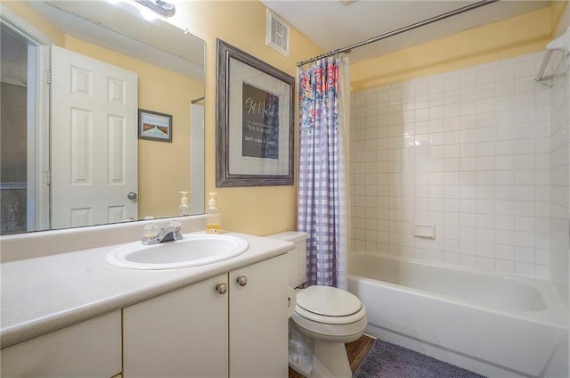 11629 Tomahawk Creek Pkwy Unit G, Leawood, KS 66211 - bathroom featuring toilet, shower / tub combo, and vanity