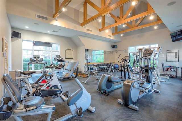 11629 Tomahawk Creek Pkwy Unit G, Leawood, KS 66211 - exercise room with high vaulted ceiling, plenty of natural light, beam ceiling, and recessed lighting
