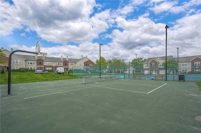 11629 Tomahawk Creek Pkwy Unit G, Leawood, KS 66211 - view of tennis court featuring fence and a residential view