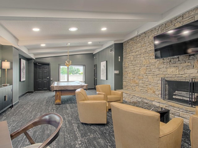 rec room featuring beam ceiling, carpet flooring, a stone fireplace, recessed lighting, and baseboards