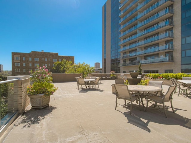view of patio featuring outdoor dining area