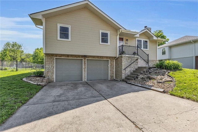 view of front of property featuring an attached garage, a chimney, concrete driveway, stone siding, and stairs