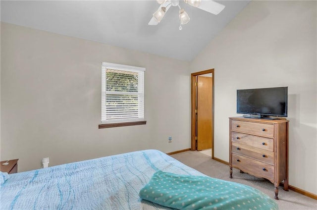 bedroom featuring baseboards, carpet floors, lofted ceiling, and ceiling fan