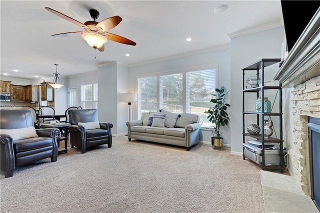 5918 Theden St, Shawnee, KS 66218 - living room with a ceiling fan, baseboards, a stone fireplace, ornamental molding, and light carpet