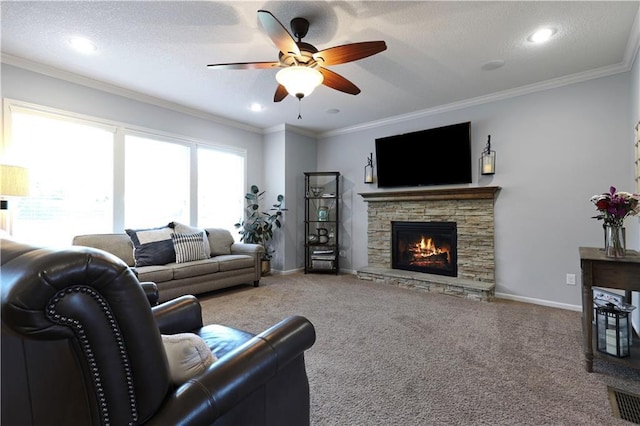 5918 Theden St, Shawnee, KS 66218 - living area featuring a fireplace, ceiling fan, carpet, baseboards, and crown molding
