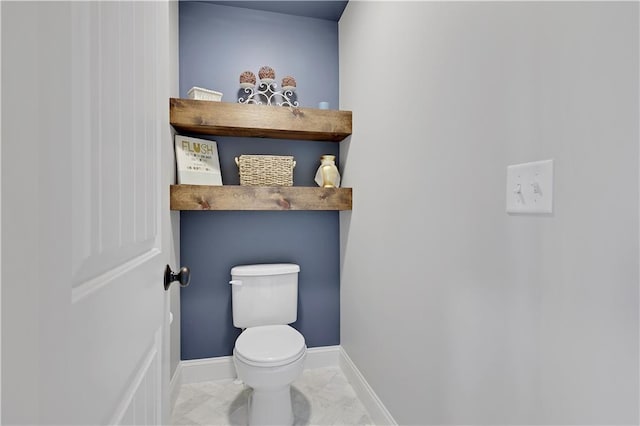 5918 Theden St, Shawnee, KS 66218 - bathroom with toilet, baseboards, and marble finish flooring