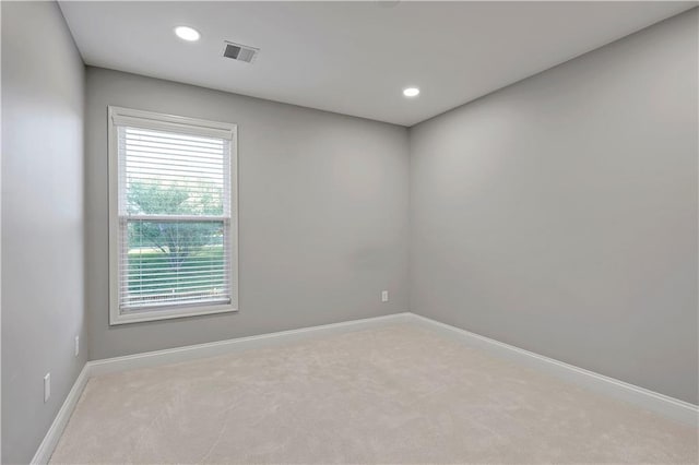 5918 Theden St, Shawnee, KS 66218 - unfurnished room featuring carpet flooring, baseboards, plenty of natural light, and recessed lighting