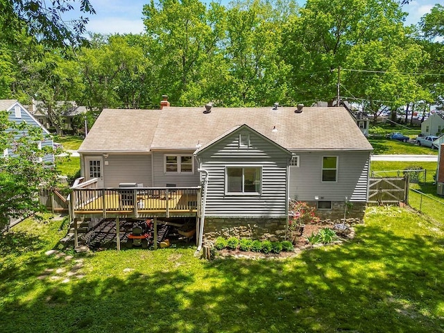 6138 Hadley St, Merriam, KS 66202 - back of house with a wooden deck, a chimney, and stairs