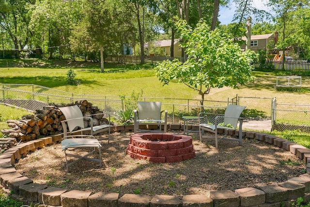 6138 Hadley St, Merriam, KS 66202 - view of yard featuring an outdoor fire pit