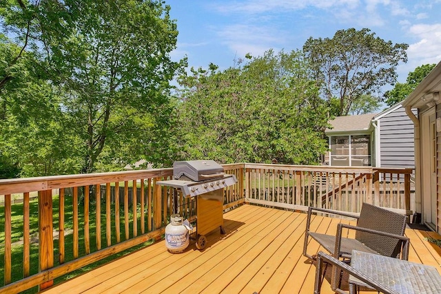 6138 Hadley St, Merriam, KS 66202 - deck featuring a sunroom and grilling area