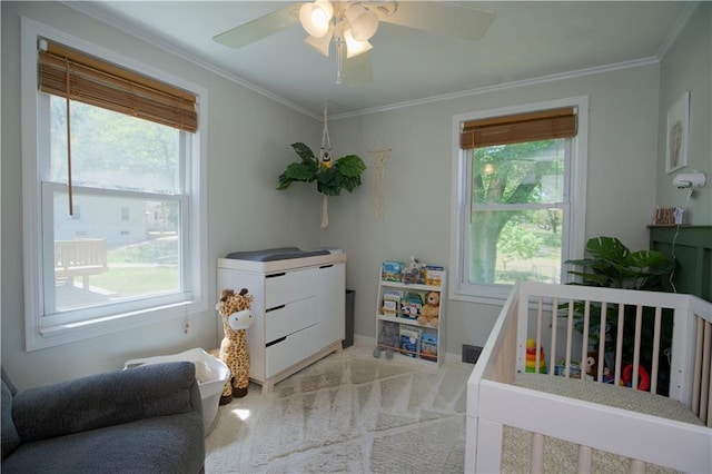 6138 Hadley St, Merriam, KS 66202 - carpeted bedroom with multiple windows, crown molding, and a ceiling fan