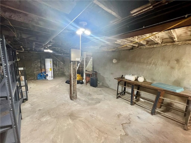 2312 Maple Ave, Leavenworth, KS 66048 - unfinished below grade area with gas water heater
