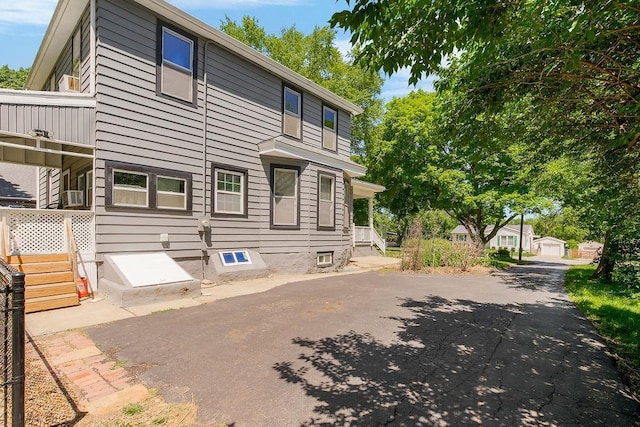 2312 Maple Ave, Leavenworth, KS 66048 - rear view of house with cooling unit