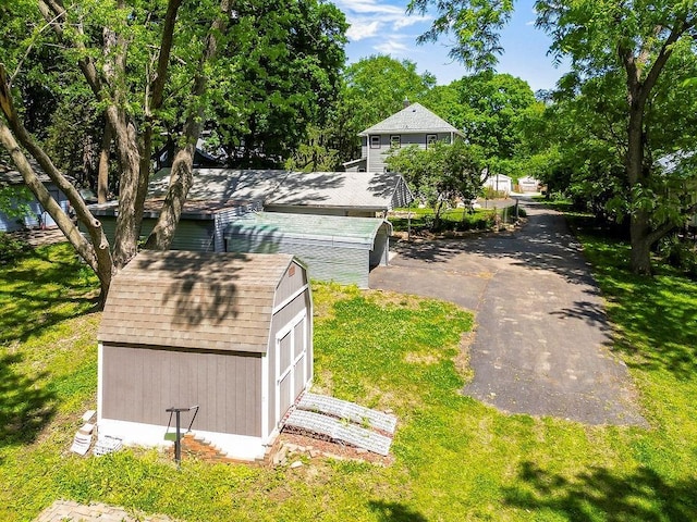 2312 Maple Ave, Leavenworth, KS 66048 - view of green lawn with view of wooded area